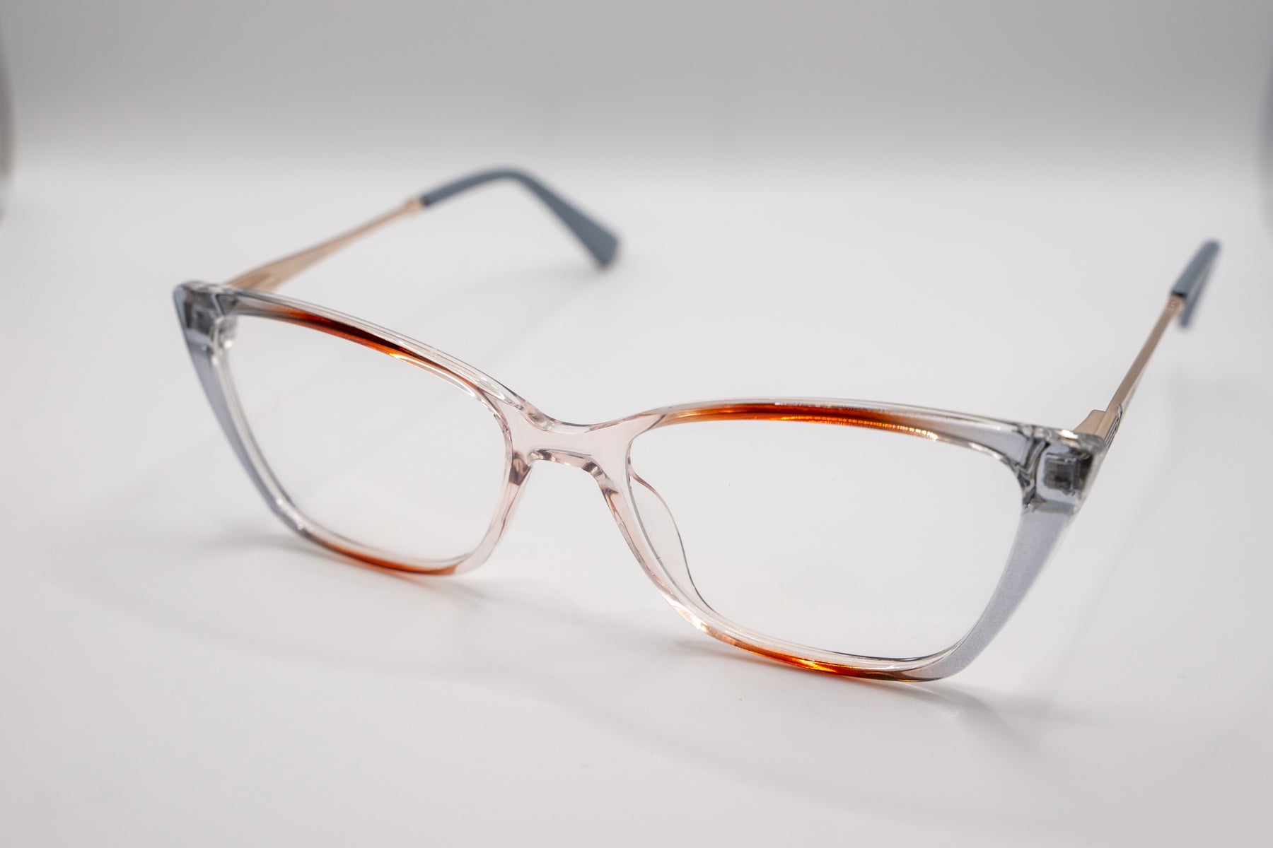 Armação ANA VIEL em Acetato - Hastes Metal Dourada - Cor Marrom e Cinza Transparente